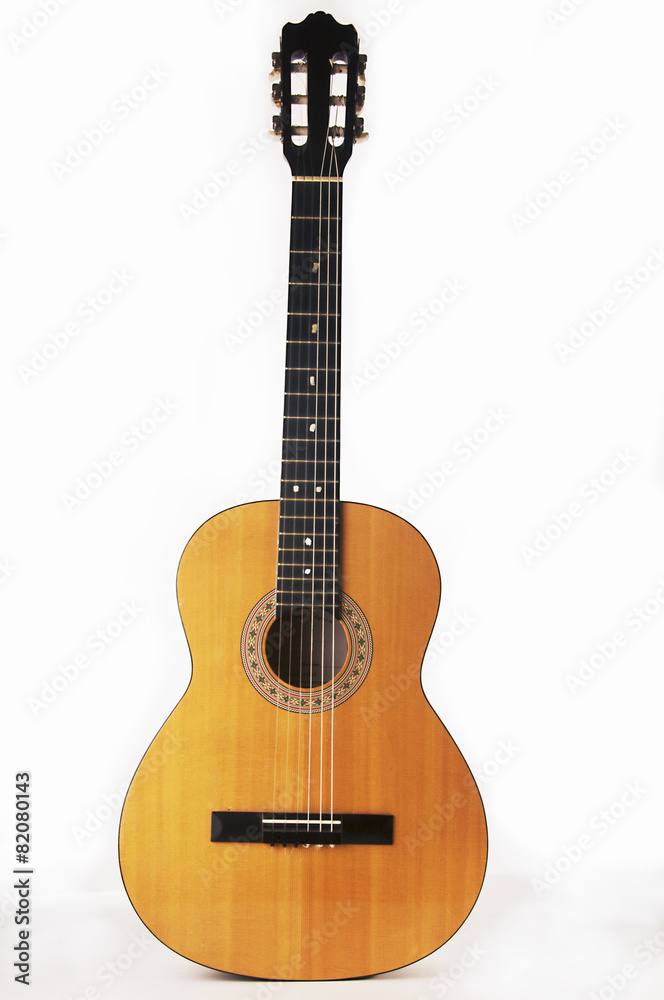 Studio detail photograph of an acoustic spanish classical guitar