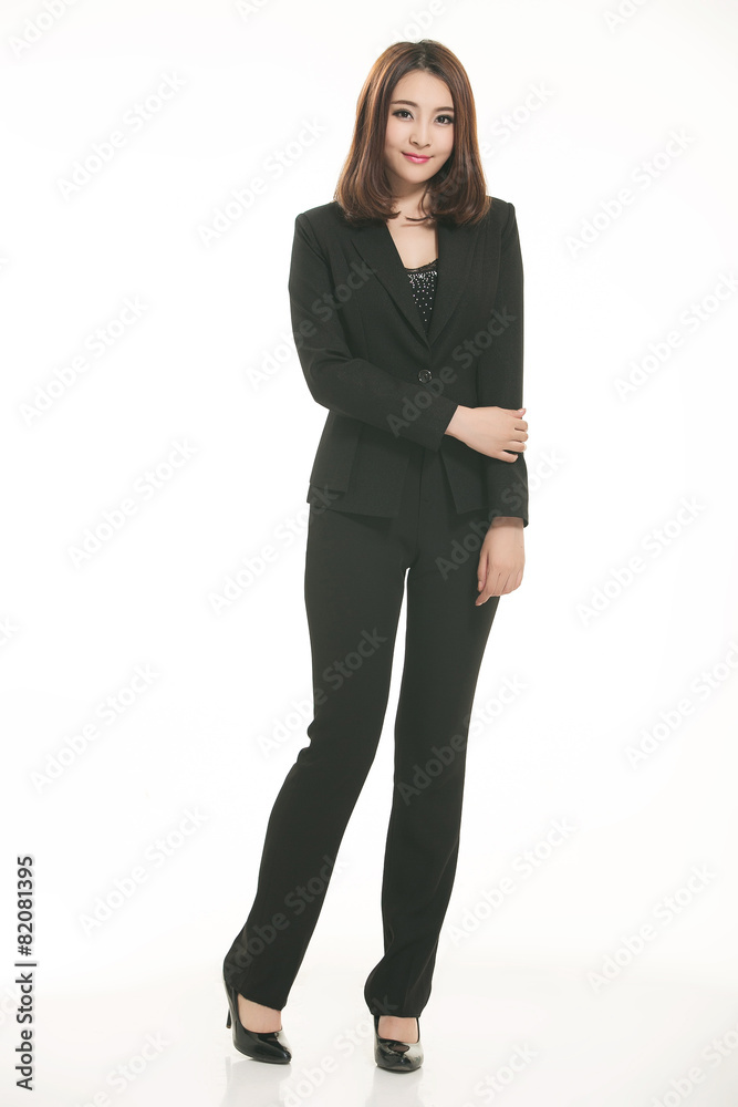 Young Asian women wearing a suit in front of a white background Young Asian women wearing a suit in front of a white background