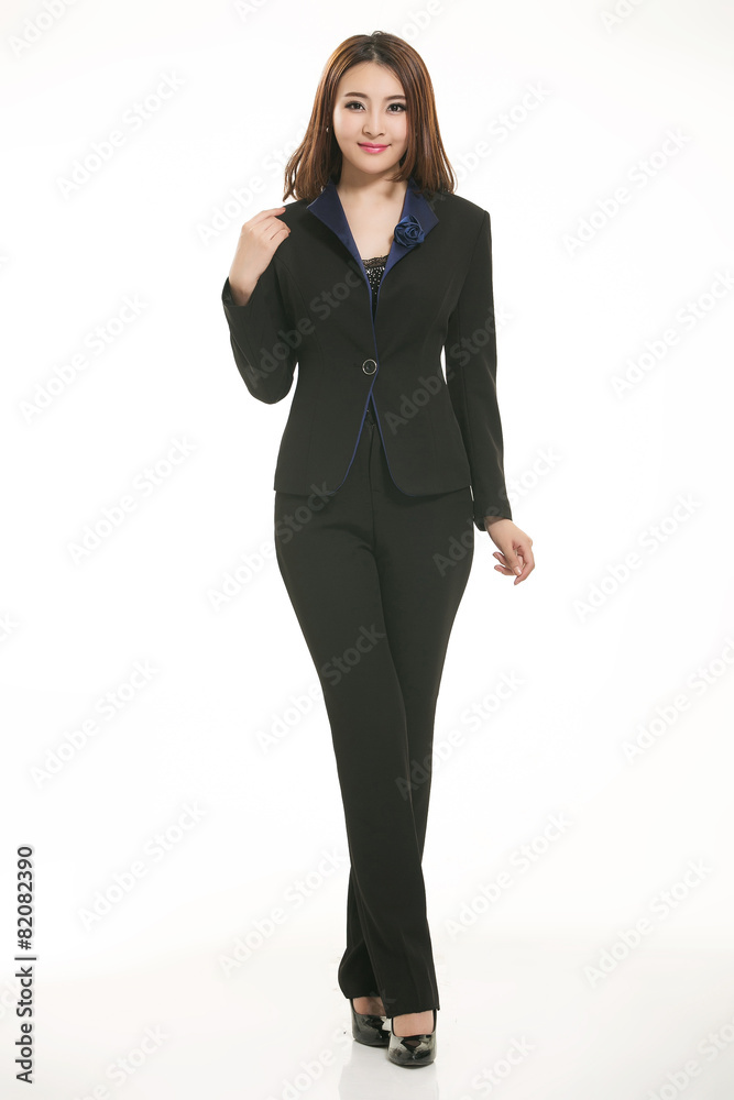 Young Asian women wearing a suit in front of a white background