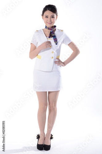 Active girl wear professional attire in front of a white backgro
