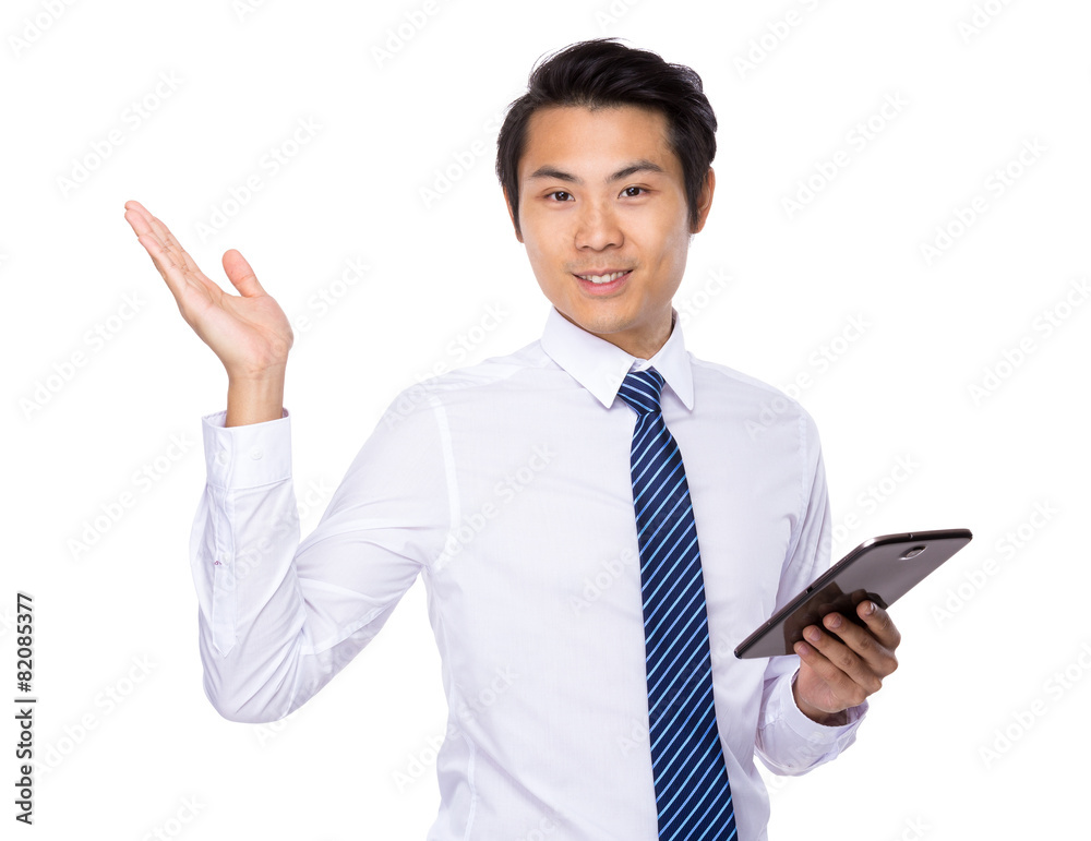 Asian Businessman use of digital tablet and open hand palm Asian Businessman use of digital tablet and open hand palm