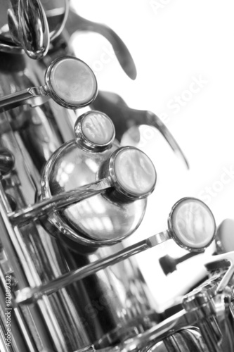 Sticker A fragment of the valve of the saxophone in black and white