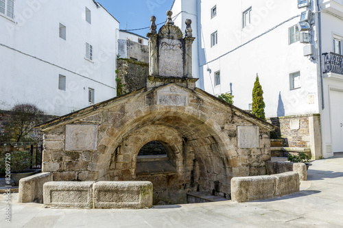 Old antique fountain in Mondonedo  Spain photo