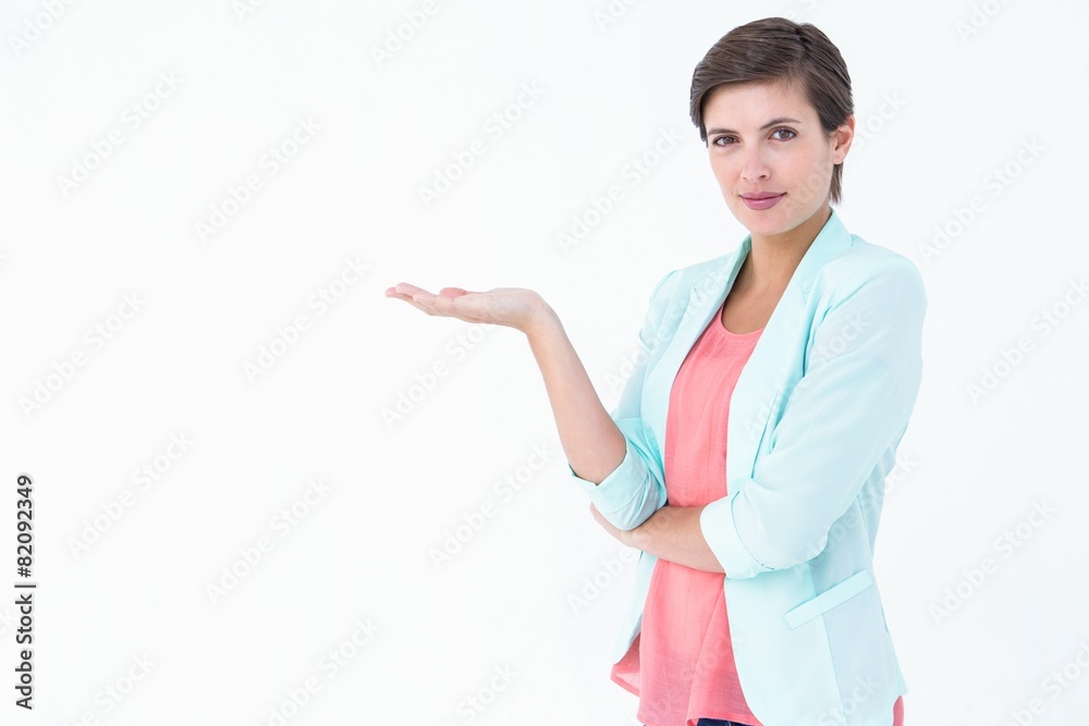 Pretty brunette presenting something Pretty brunette presenting something