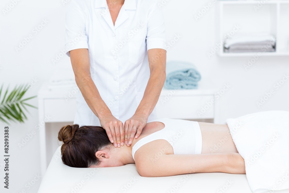 Physiotherapist doing neck massage