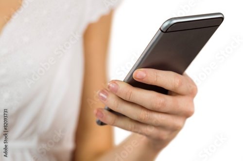 Woman sending a text message