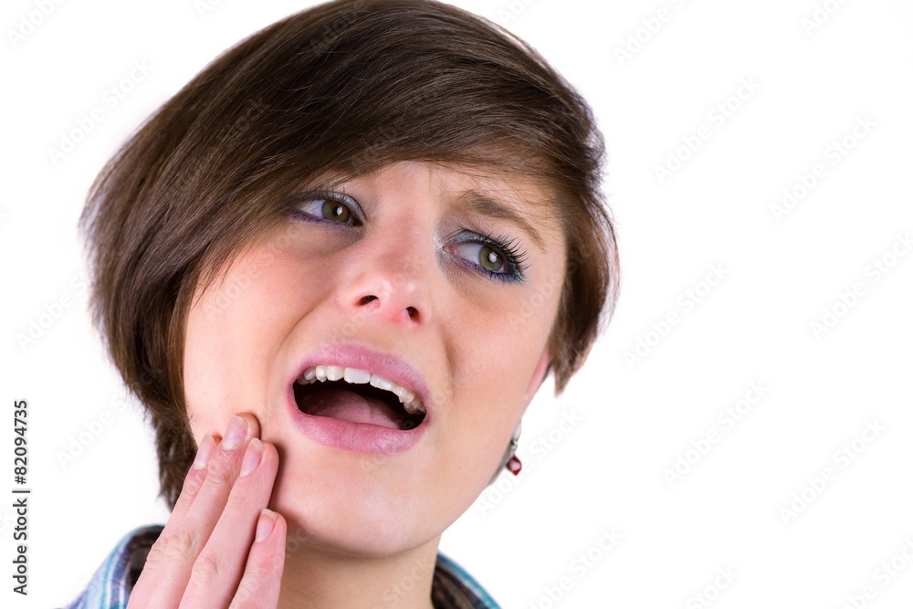 Pretty brunette with a toothache