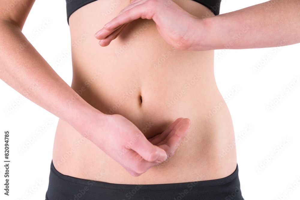 Woman with hands over belly