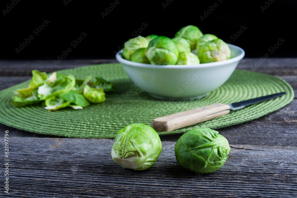 Brussels sprouts on wood table Brussels sprouts on wood table