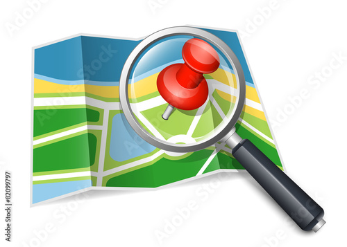 Paper map with magnifying glass