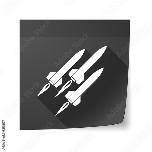 Sticky note icon with missiles