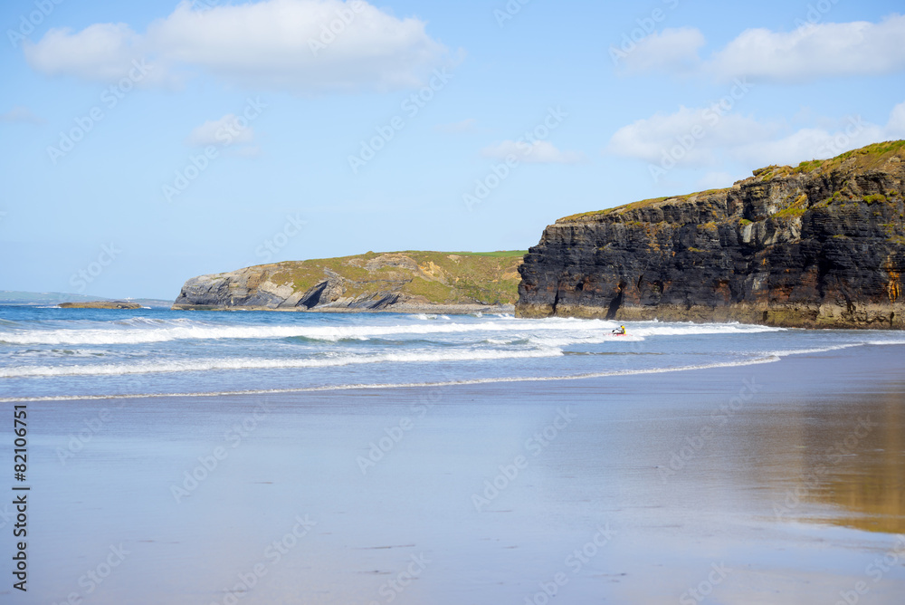 bright winter view of kayaker at ballybunion sandy beach bright winter view of kayaker at ballybunion sandy beach