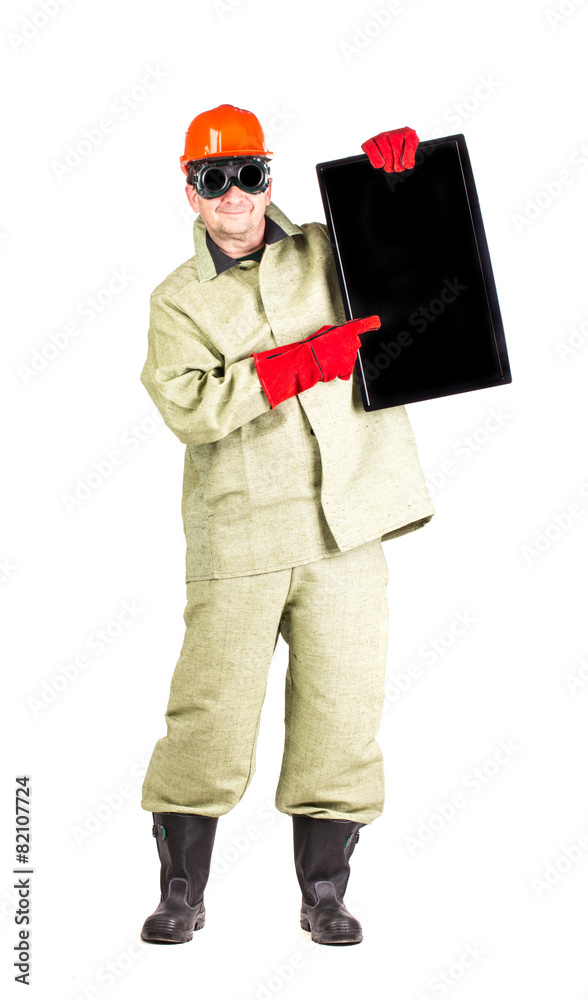 Welder in hard hat with paper Welder in hard hat with paper