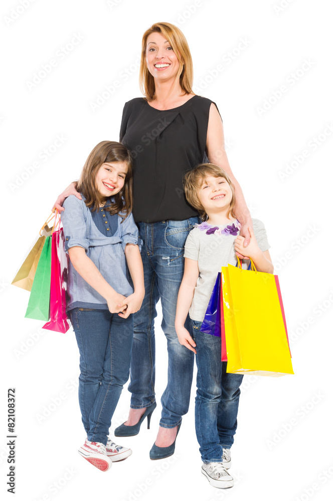 Happy shopping mother and daughters smiling