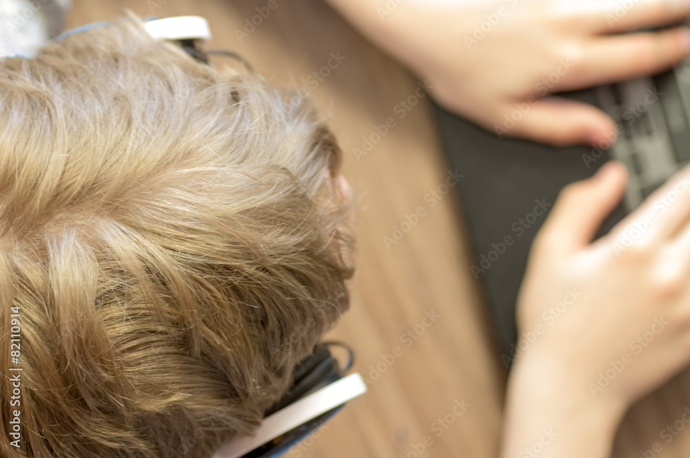 Fototapeta premium Teenager for laptop top view