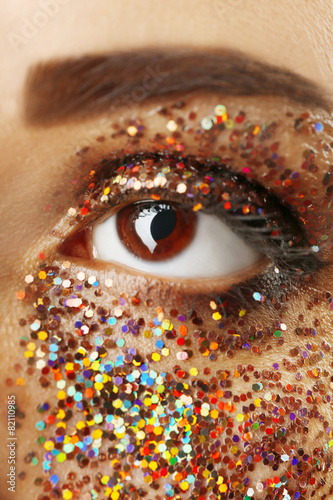 Female eye with fancy glitt...