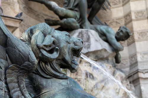statues of Fountain Saint Michel in Paris