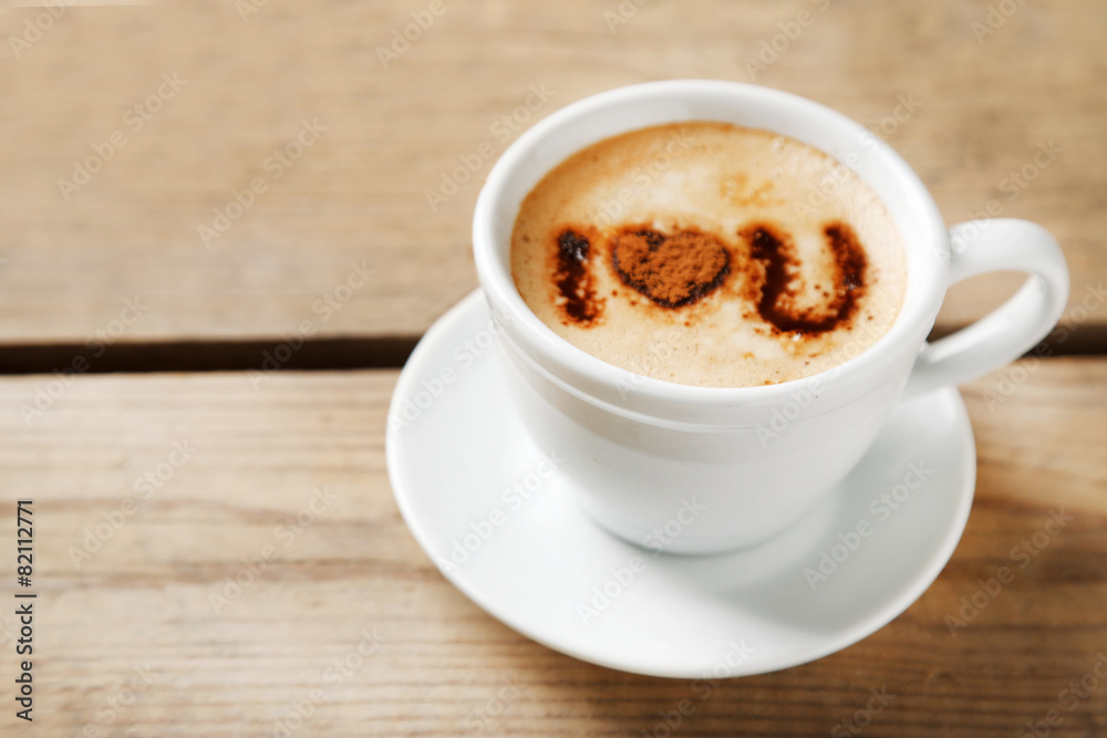 Cup of coffee on old wooden table Cup of coffee on old wooden table