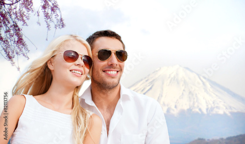 happy couple over fuji mountain in japan © Syda Productions