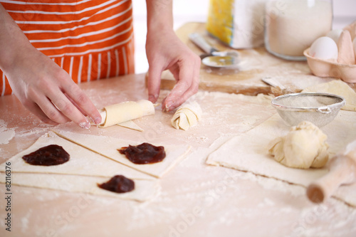 Making croissant cookies.