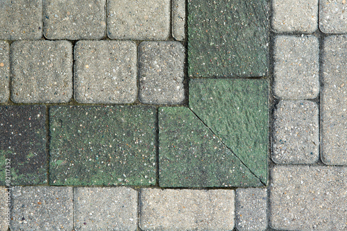 Corner pattern in grey brick paving