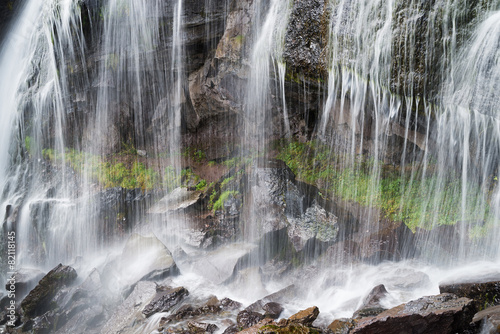 Waterfall as a background. Beautiful natural composition