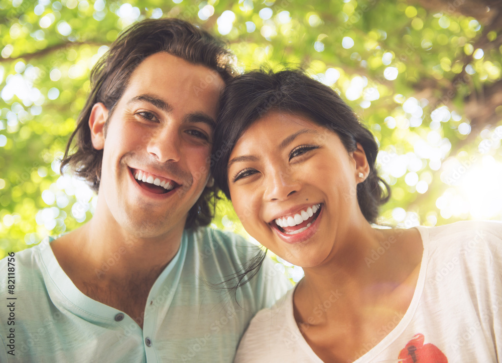 Couple smiling outdoors