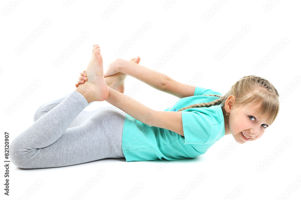 Little girl doing exercises isolated on white Little girl doing exercises isolated on white