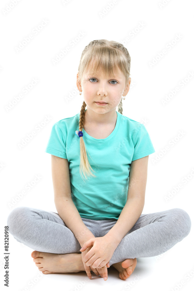 Little girl doing exercises isolated on white Little girl doing exercises isolated on white