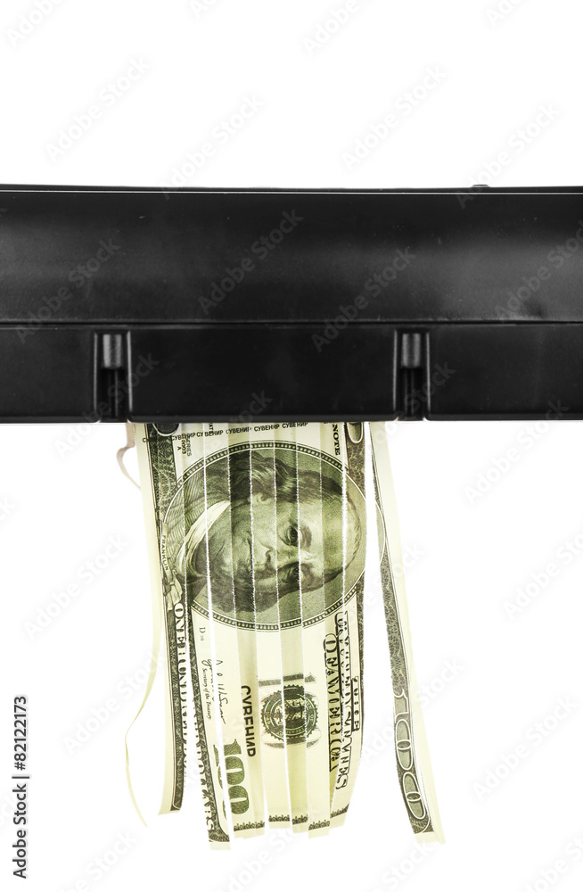 Destroyed money from shredder isolated on white Destroyed money from shredder isolated on white