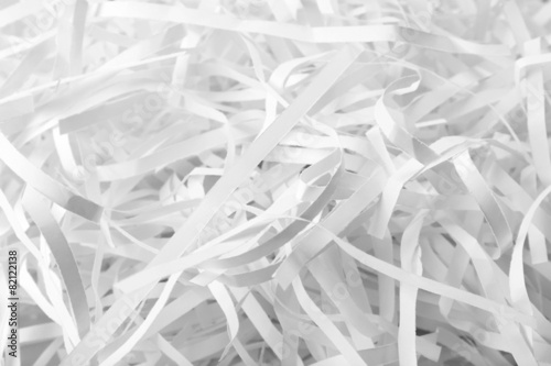 Quadro em tela Strips of destroyed paper from shredder, closeup