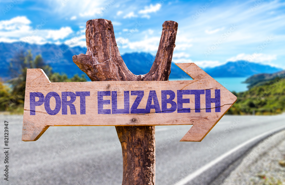 Port Elizabeth wooden sign with road background