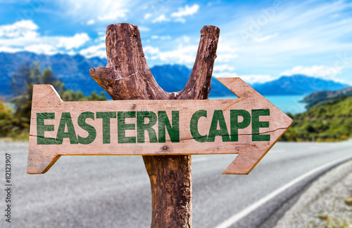 Eastern Cape wooden sign with road background