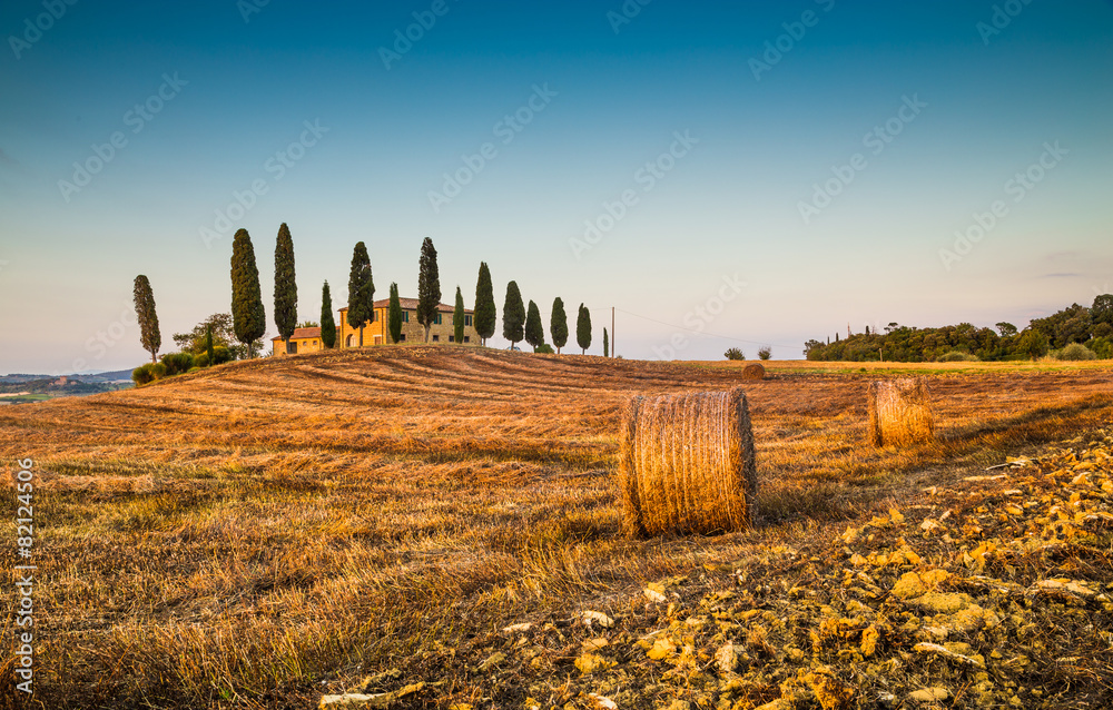 Tuscany landscape with farm house at sunset, Val d'Orcia, Italy