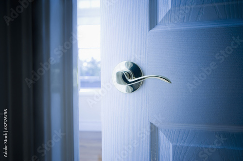 Close up of handle on open door