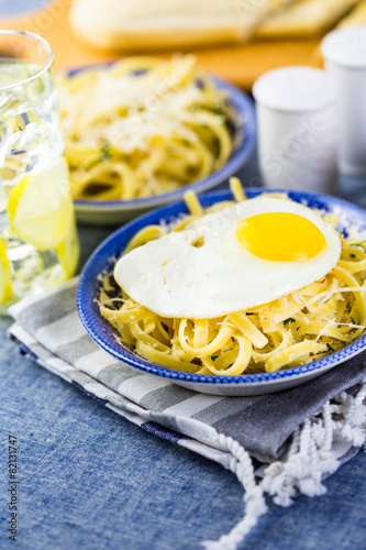 Pasta with crispy eggs photo