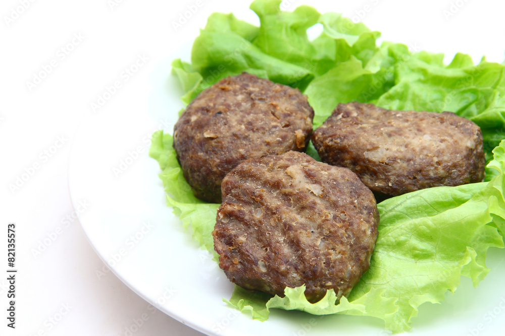 beef Patty with lettuce on white background