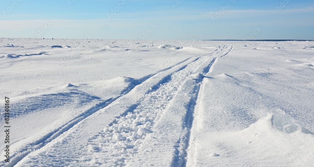 Polar landscape- frozen sea with blue sky background