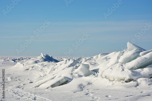 Polar landscape- frozen sea with blue sky background © kalichka