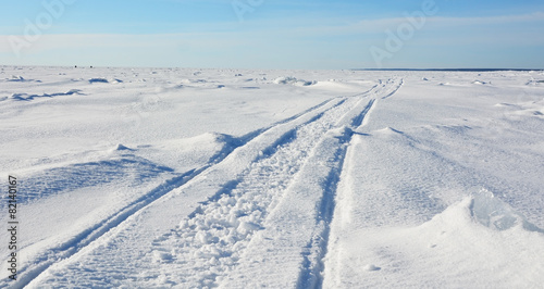 Polar landscape- frozen sea with blue sky background © kalichka