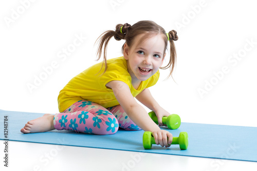 child doing fitness exercises