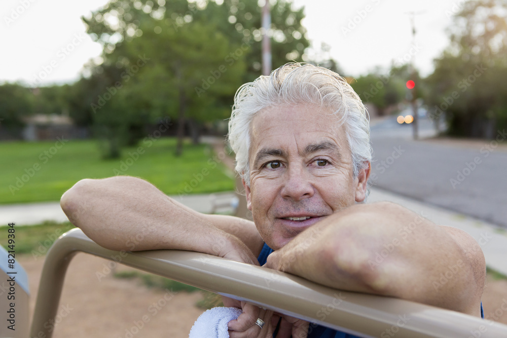 Older Hispanic man exercising in park Older Hispanic man exercising in park