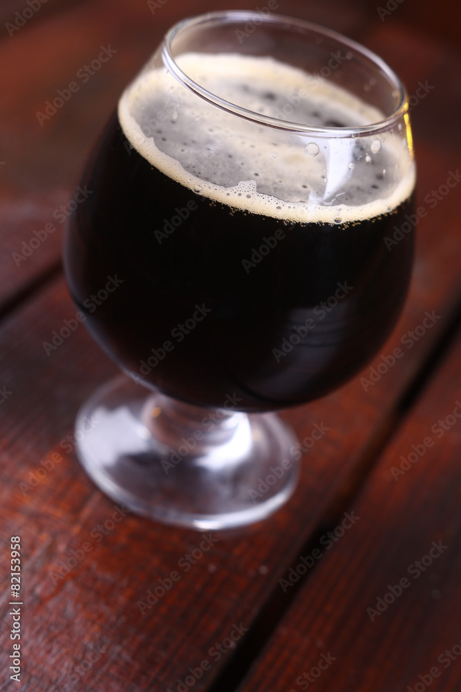 Glass of dark stout Glass of dark stout