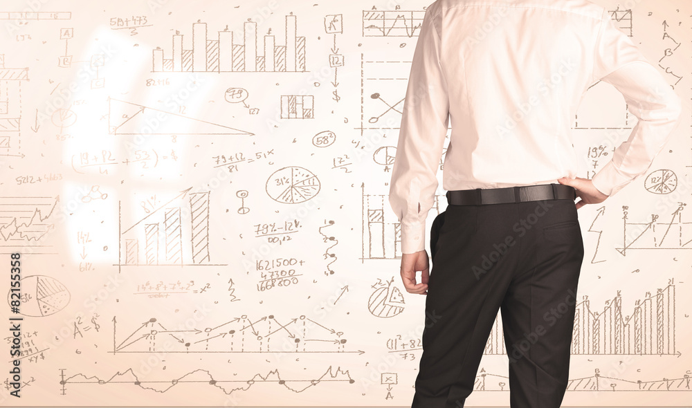 Businessman with diagrams and graphs Businessman with diagrams and graphs