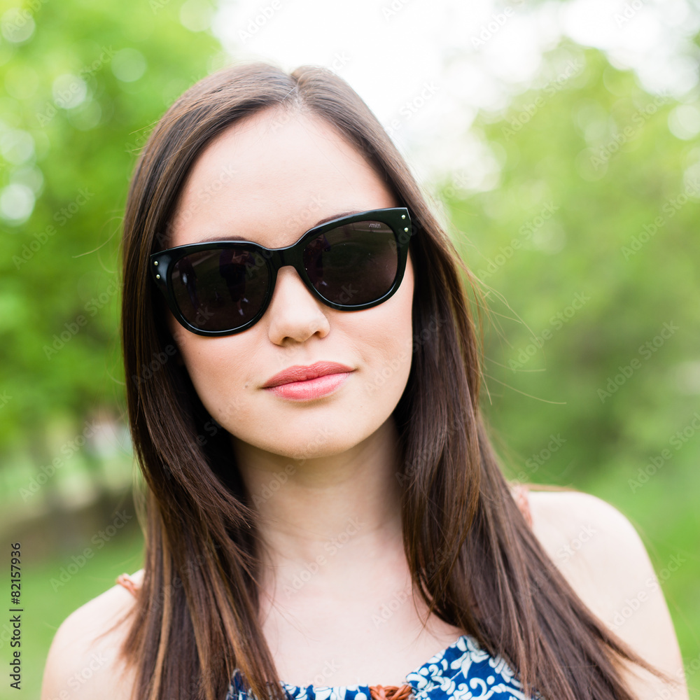 Summer girl portrait. Asian woman smiling happy on sunny summer 