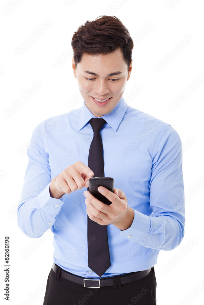 young smiling businessman with smart phone young smiling businessman with smart phone