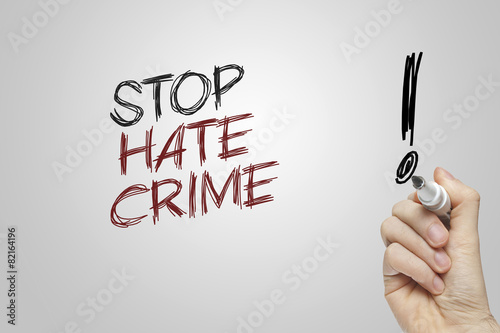 Hand writing stop hate crime