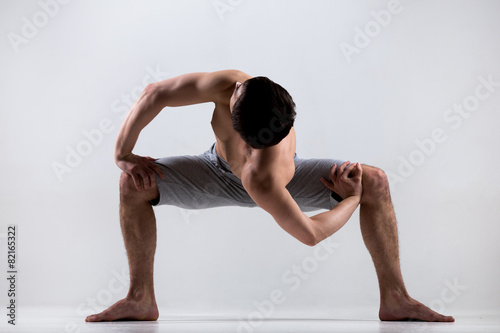 Temple twist yoga pose photo