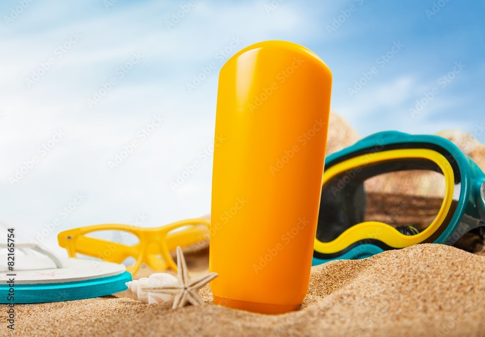 Suntan Lotion. Sun Cream in the Sand Suntan Lotion. Sun Cream in the Sand