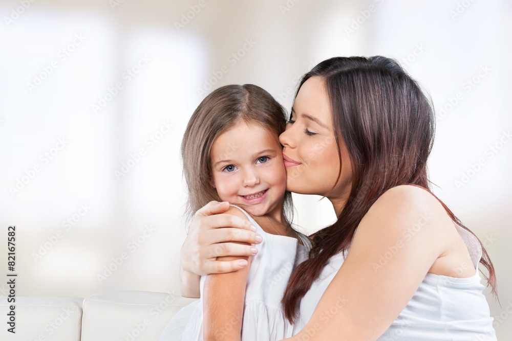 Adorable. Mother and Baby kissing and hugging. Happy Family Adorable. Mother and Baby kissing and hugging. Happy Family